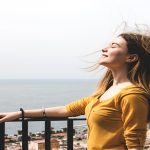 woman-enjoying-breath-wind